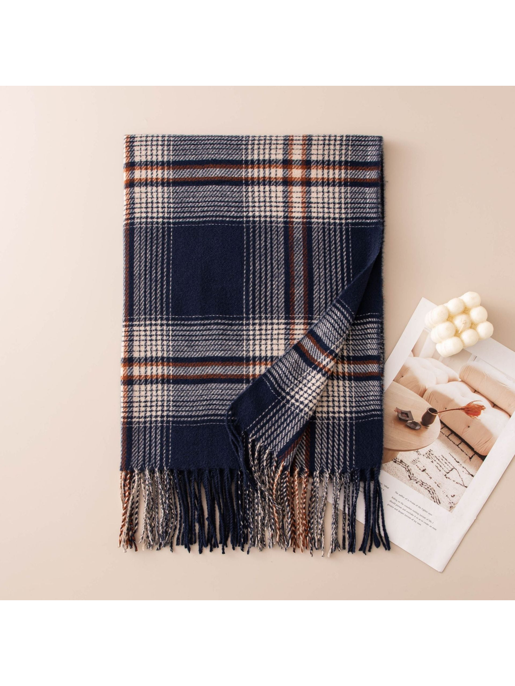 Navy plaid scarf with twisted fringe, folded flat view