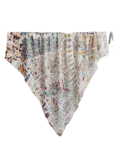 Square scarf with a multicolor botanical patchwork-style print, full view