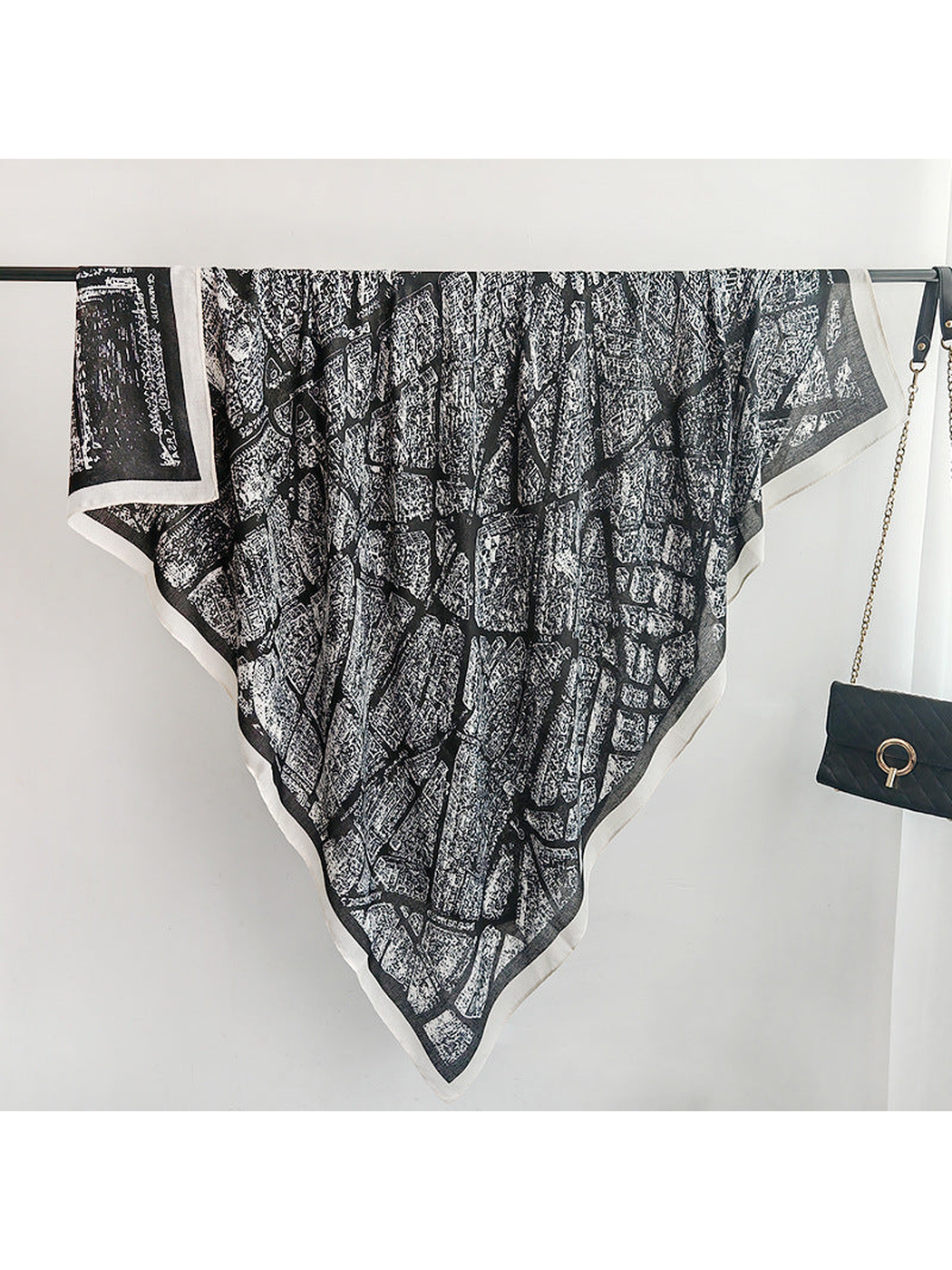 Black-base square scarf with white city-map print and contrasting border