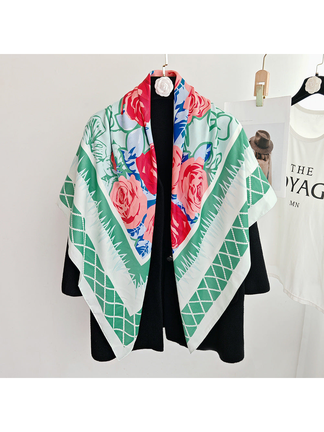 Green floral square scarf displayed in a full draped view