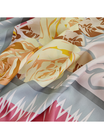 Close-up of the floral print and fine diagonal surface texture