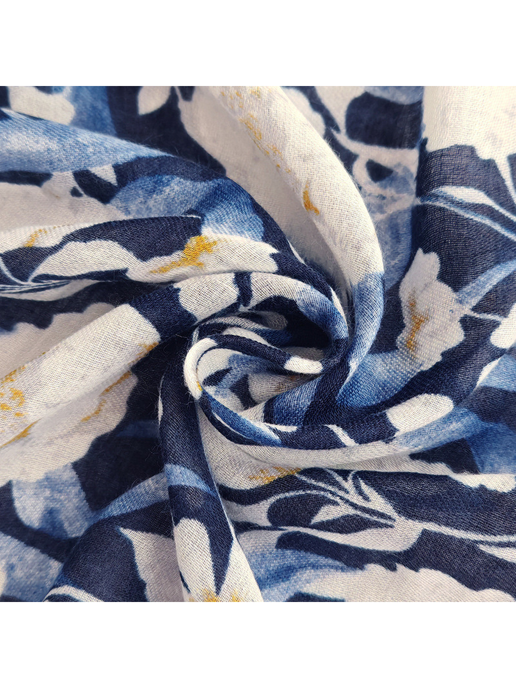 Close-up of the fine woven-look texture and blue floral print