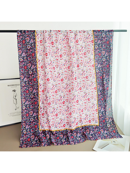 Full rectangular scarf with pale floral center and navy floral border