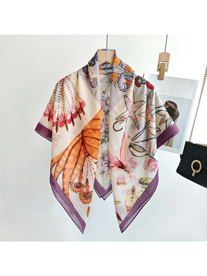 Multicolor square scarf draped open on a hanger