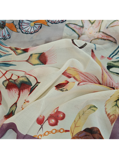 Close-up of the scarf's semi-sheer texture and multicolor print