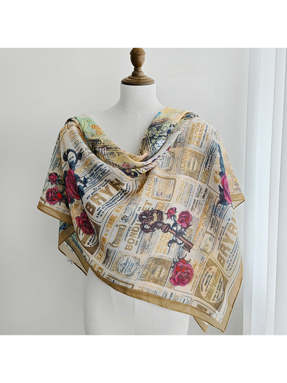 Multicolor printed square scarf draped around a dress form