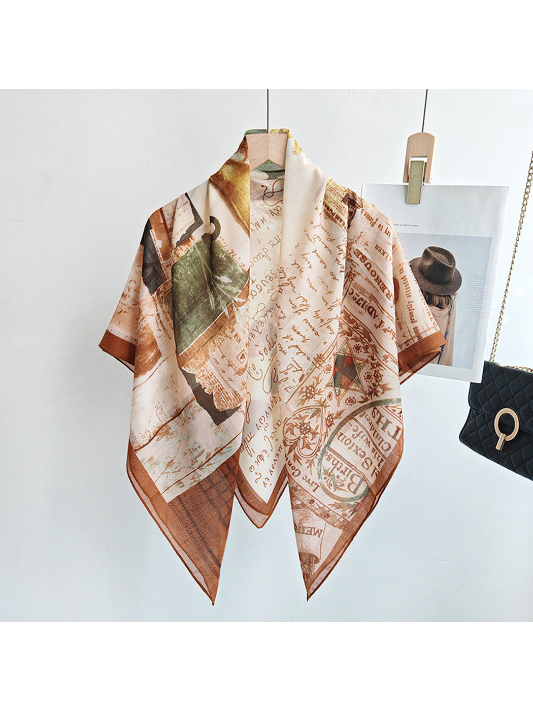 Multicolor square scarf draped over a hanger