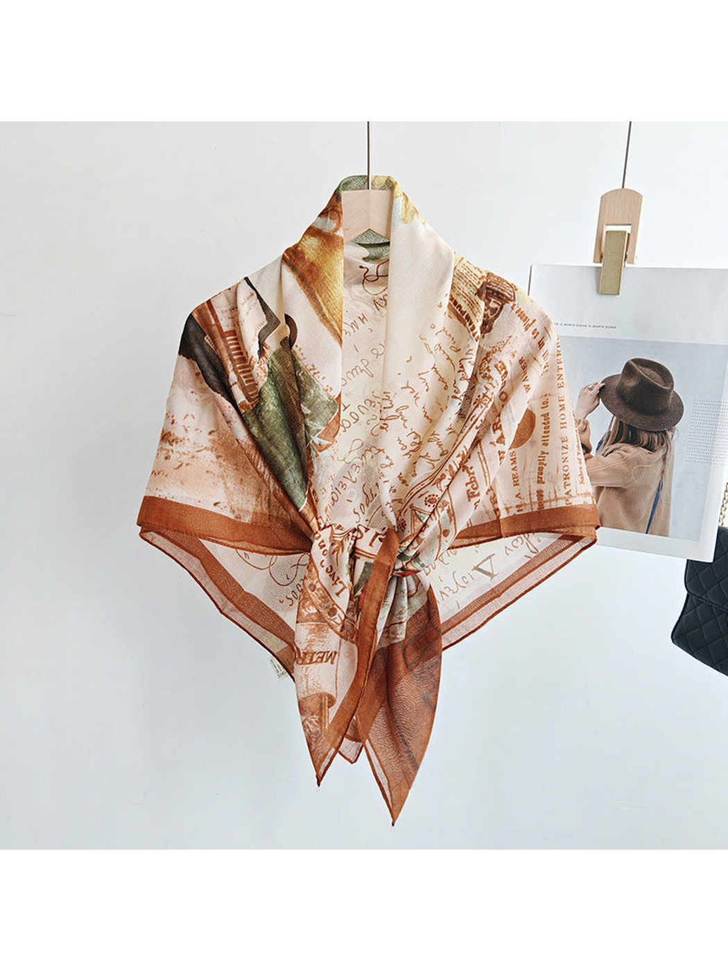 Multicolor square scarf tied at the front on a hanger