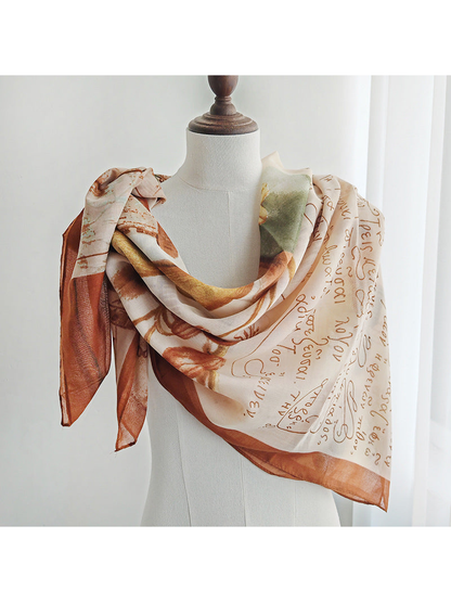 Multicolor printed scarf draped around a dress form