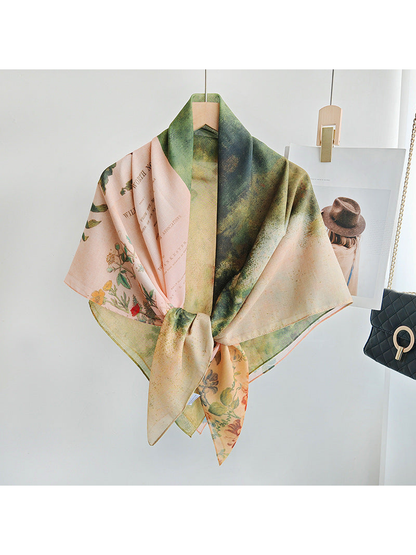 Pink and green botanical square scarf styled with a front knot