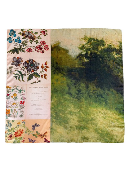 Square scarf laid flat with pink botanical collage panels and a green landscape print