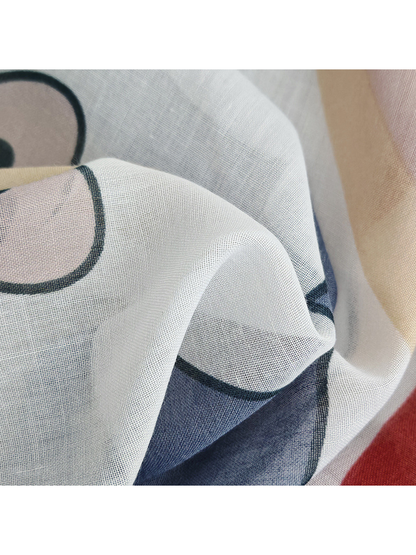 Close-up of the scarf's fine semi-sheer weave and printed outlines