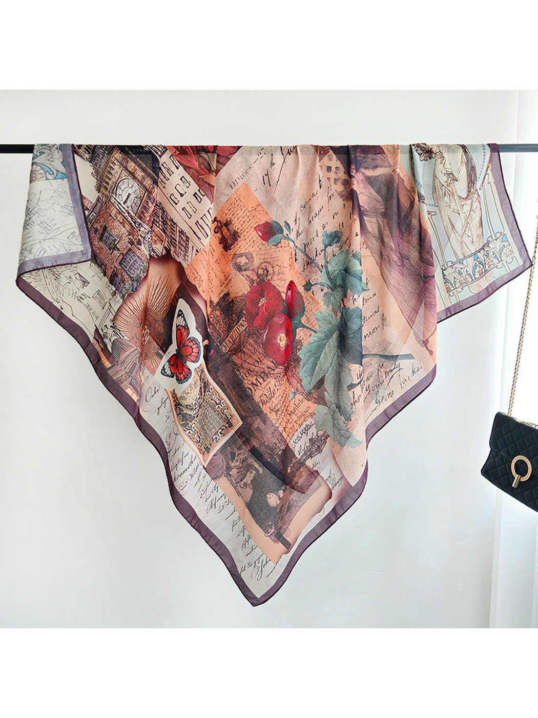 Multicolor square scarf spread over a display rail