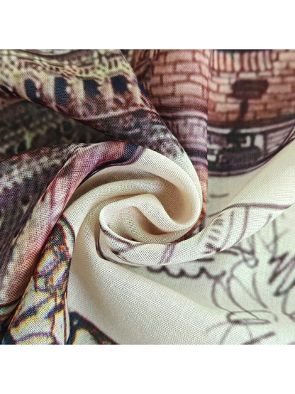 Close-up of the scarf's fine grid-like woven appearance