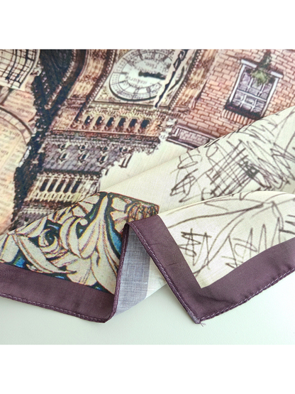 Close-up of the scarf's narrow dark purple stitched border