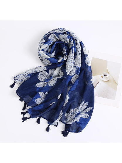 Navy floral scarf arranged in a loose flowing drape
