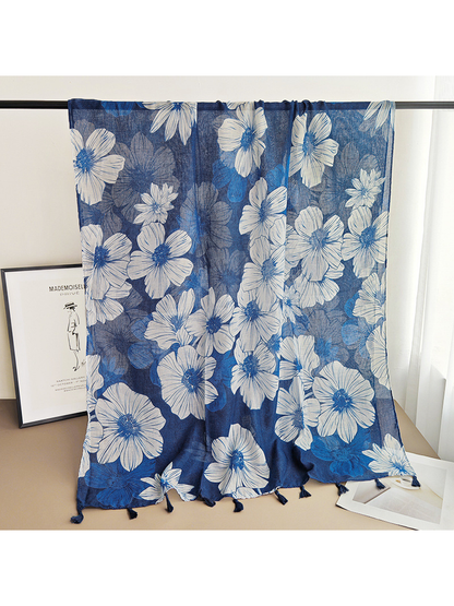 Navy rectangular floral scarf displayed fully spread with tassels