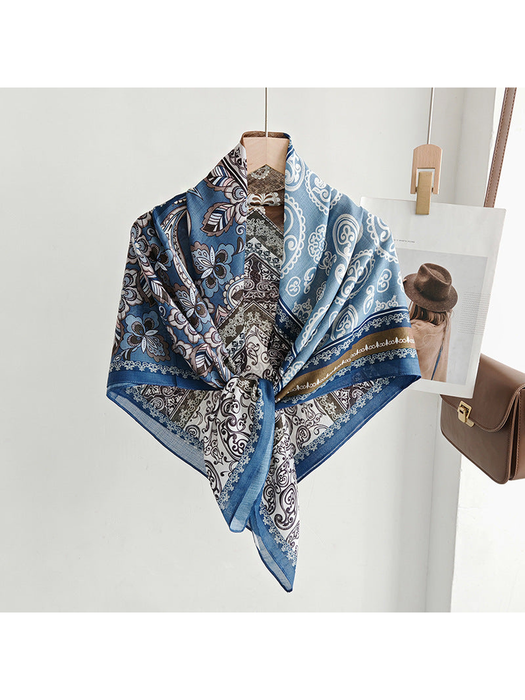 Multicolor patchwork paisley scarf tied in a draped display