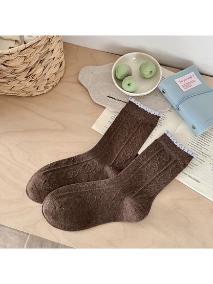 Dark Brown flecked crew socks with raised cable pattern and light blue scalloped cuffs