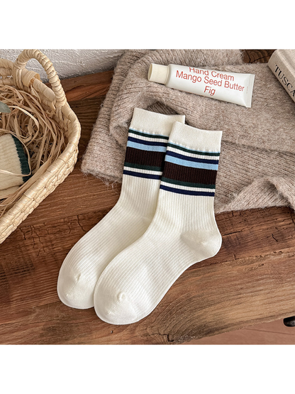 Wide Stripes ivory crew socks with brown, blue and green cuff bands