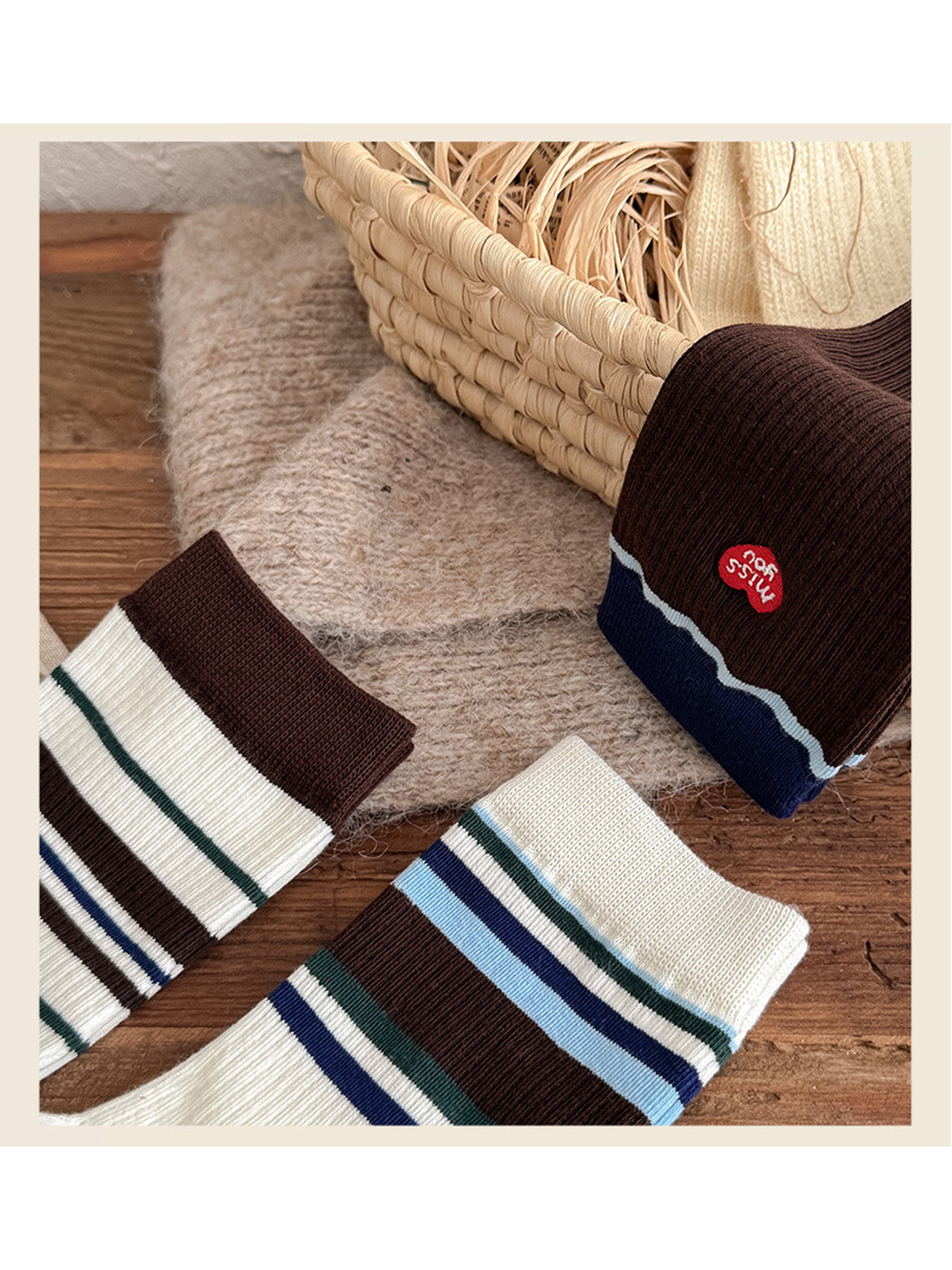 Close-up of contrasting cuffs and stripe widths across three sock styles