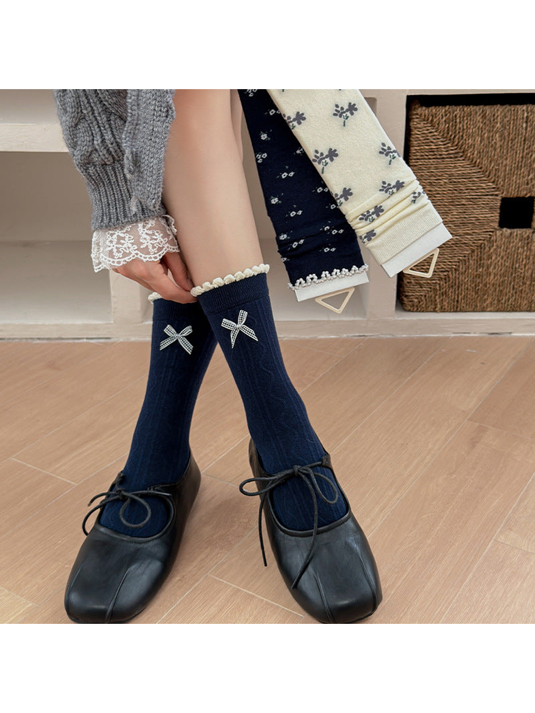 Navy Bow socks worn with black lace-up shoes