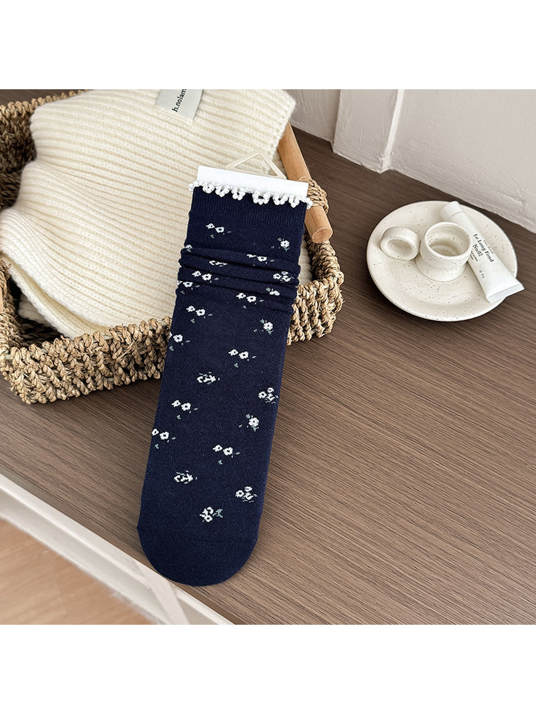 Navy Floral crew sock with tiny blossoms and looped cuff trim