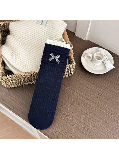 Navy Bow crew sock with cable texture and scalloped cuff trim