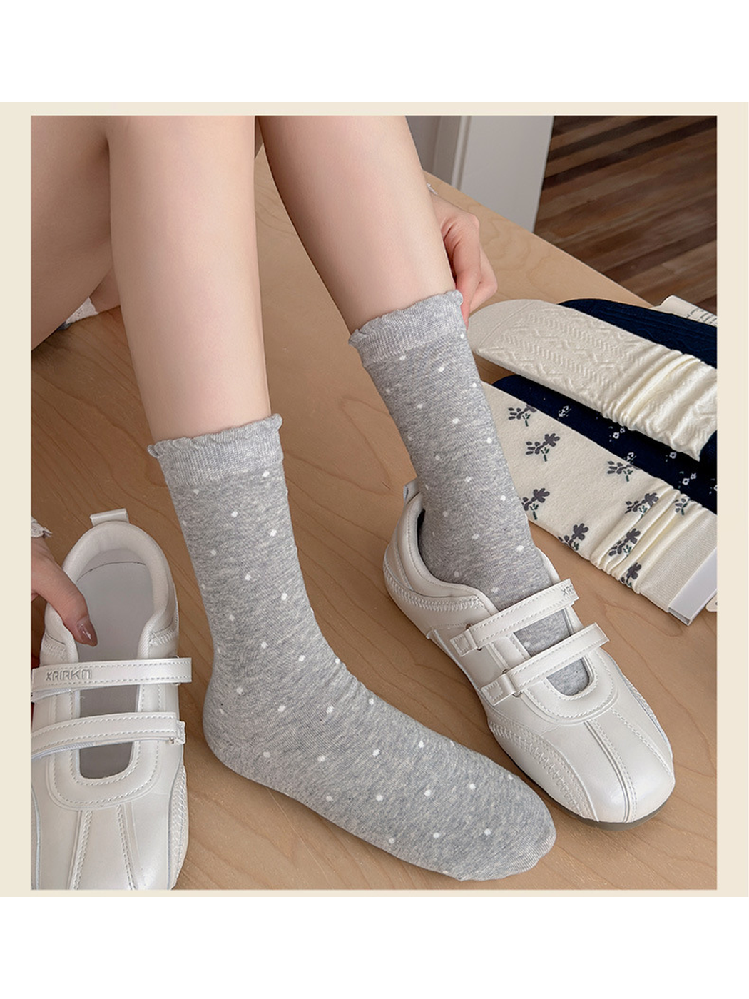 Gray Dots socks worn with white strap shoes beside floral and cable-knit styles