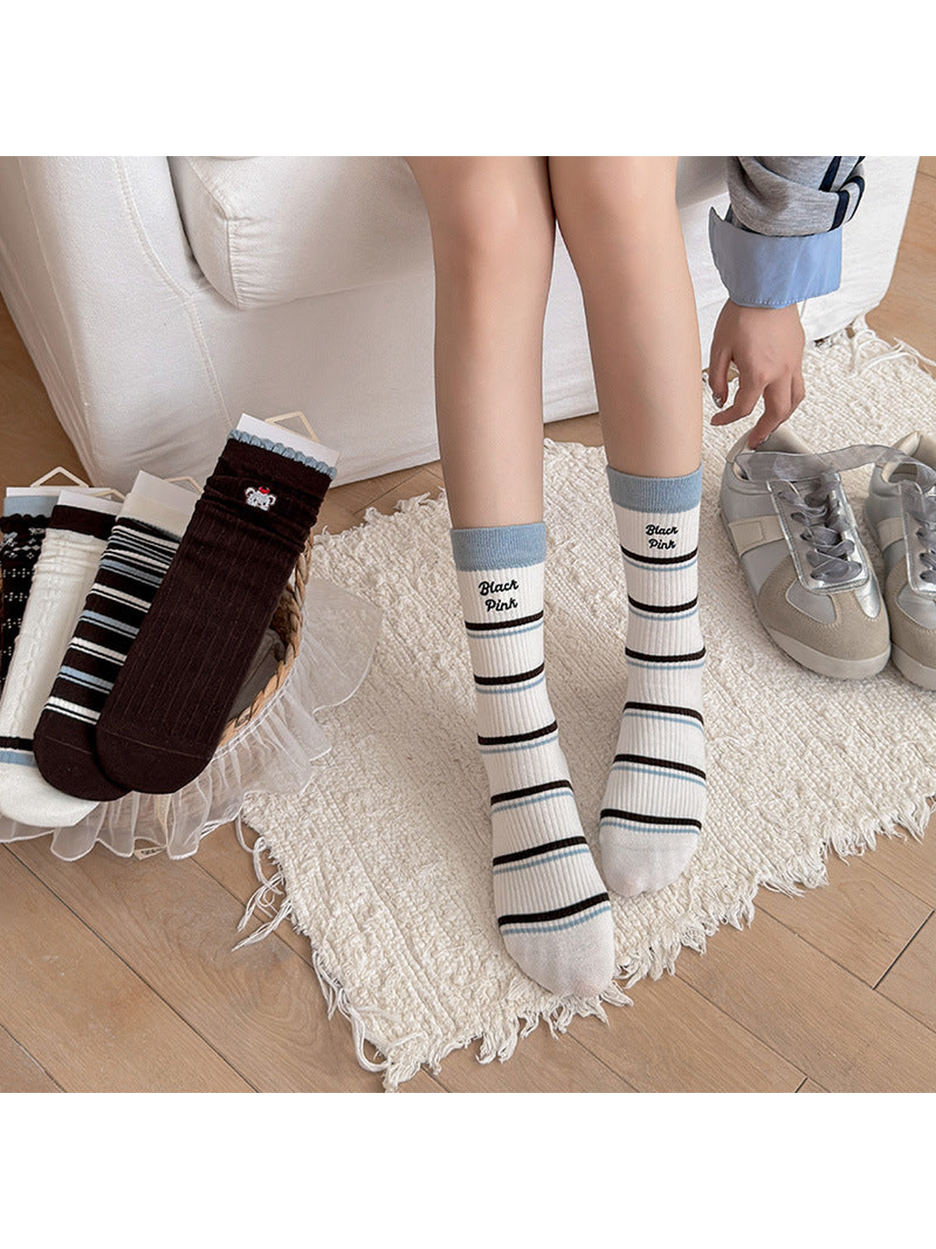 Letters crew socks worn with silver-tone sneakers