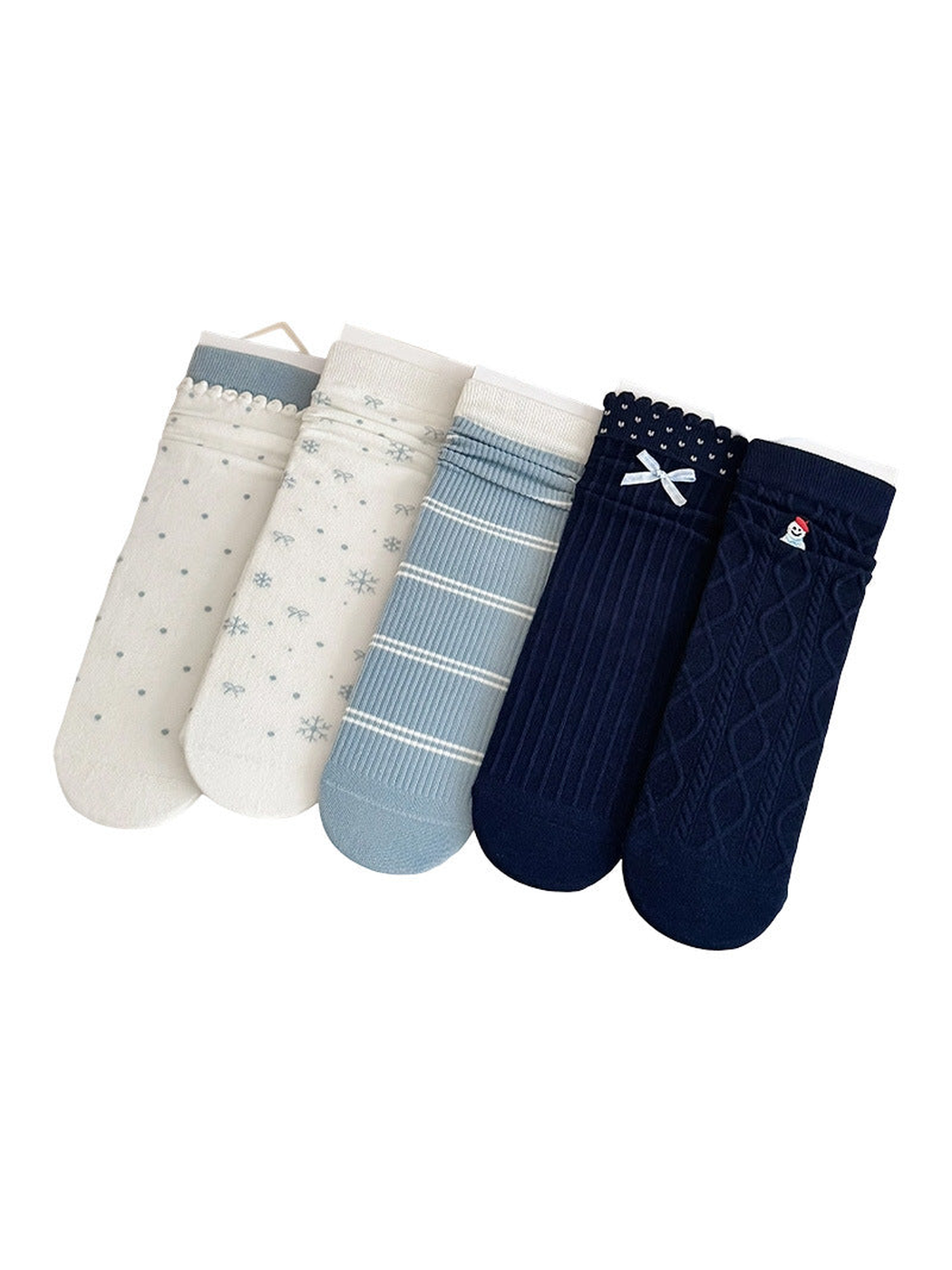 Bow, Polka Dot, Snowflake, Stripes, and Snowman crew socks displayed together