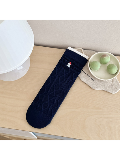 Navy Snowman crew sock with cable-textured pattern