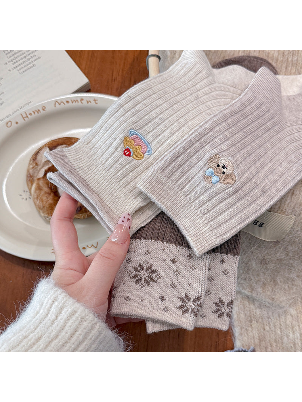 Close-up of cake, dog and snowflake sock details