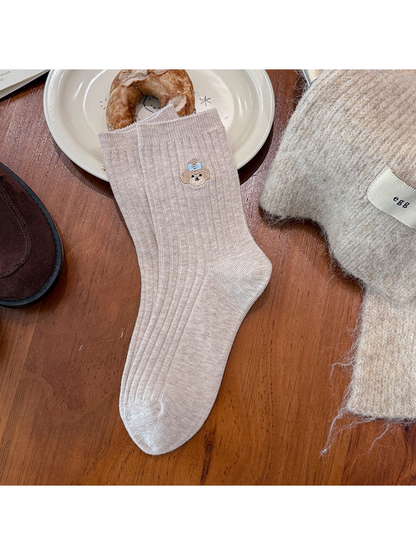 Dog crew sock in greige with blue bow embroidery