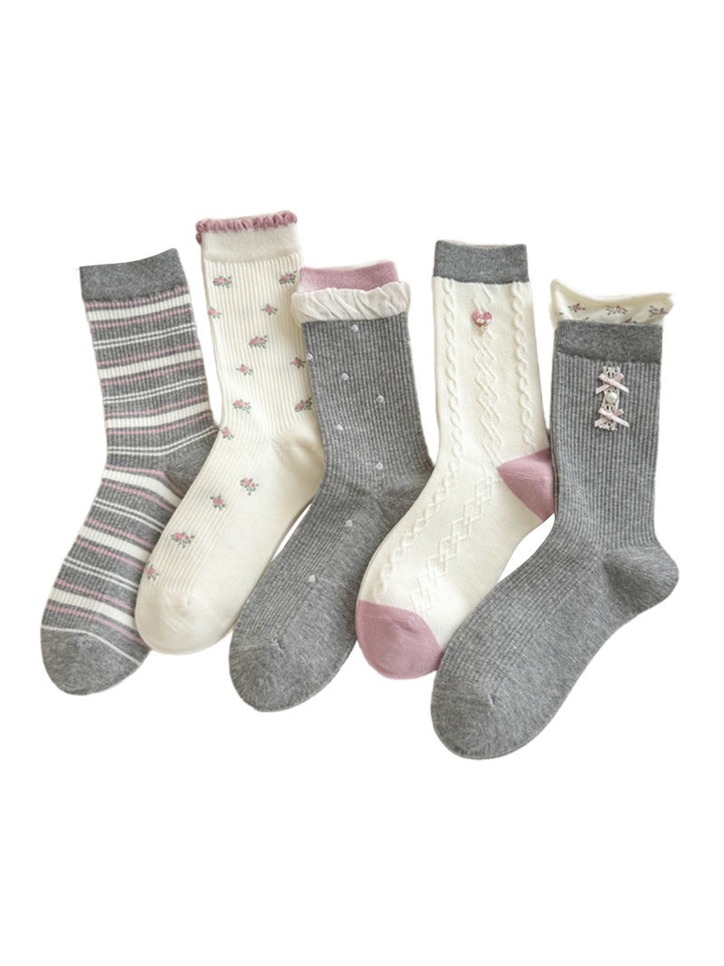 Five crew sock styles in gray, ivory and pink displayed together