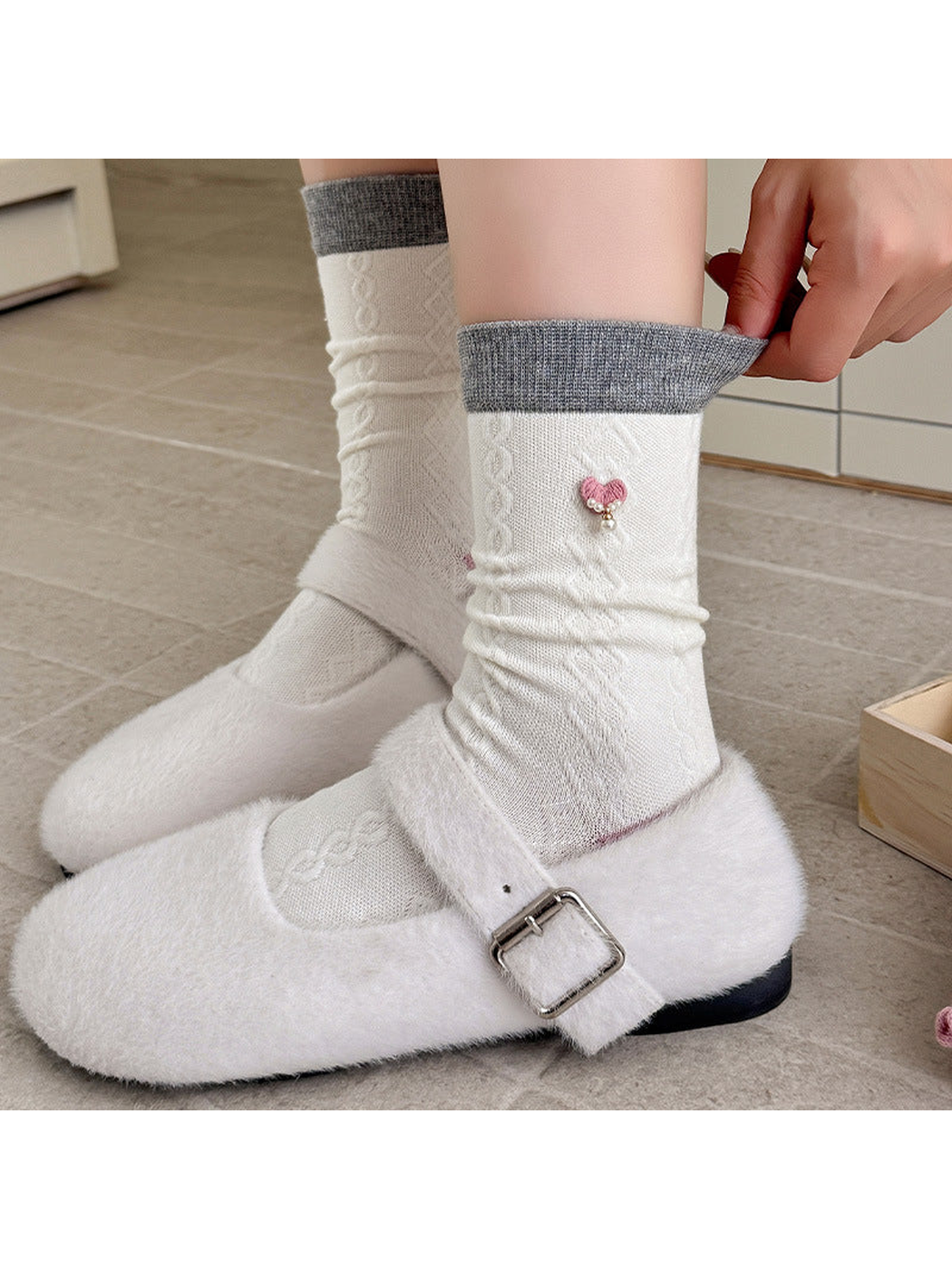 Ivory Heart Charm crew socks styled with white buckle shoes