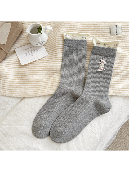 Gray Pearl Bow crew socks with floral-edged cuffs