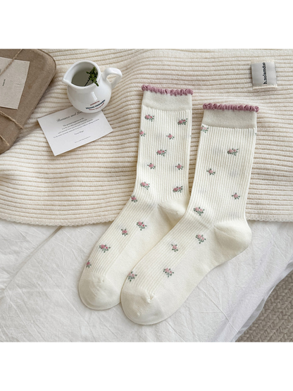Ivory Floral crew socks with pink ruffled cuffs