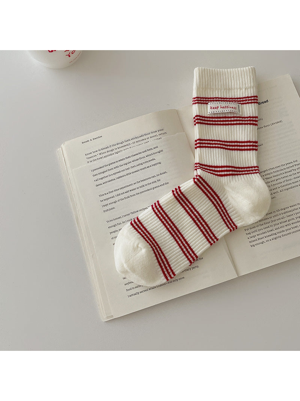 Ivory crew sock with red horizontal stripes