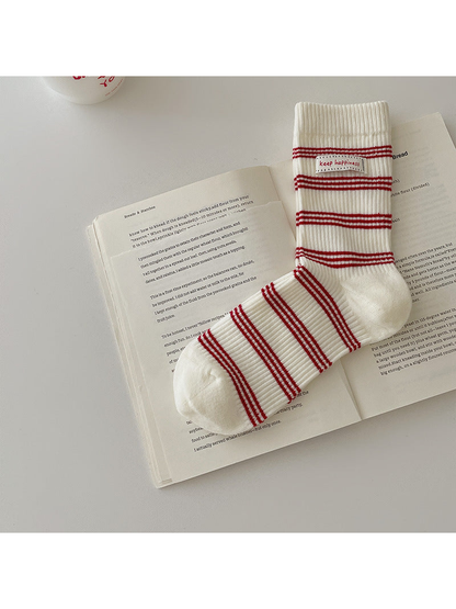 Ivory crew sock with red horizontal stripes
