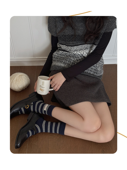 Navy striped crew socks styled with black shoes