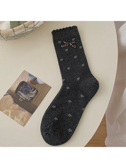 Floral Bow dark gray crew sock with scattered floral motifs