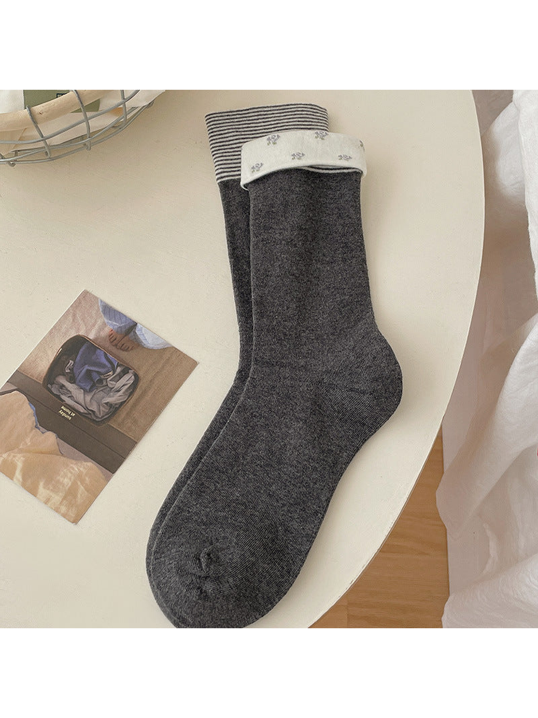 Foldover dark gray crew sock with contrasting patterned cuff