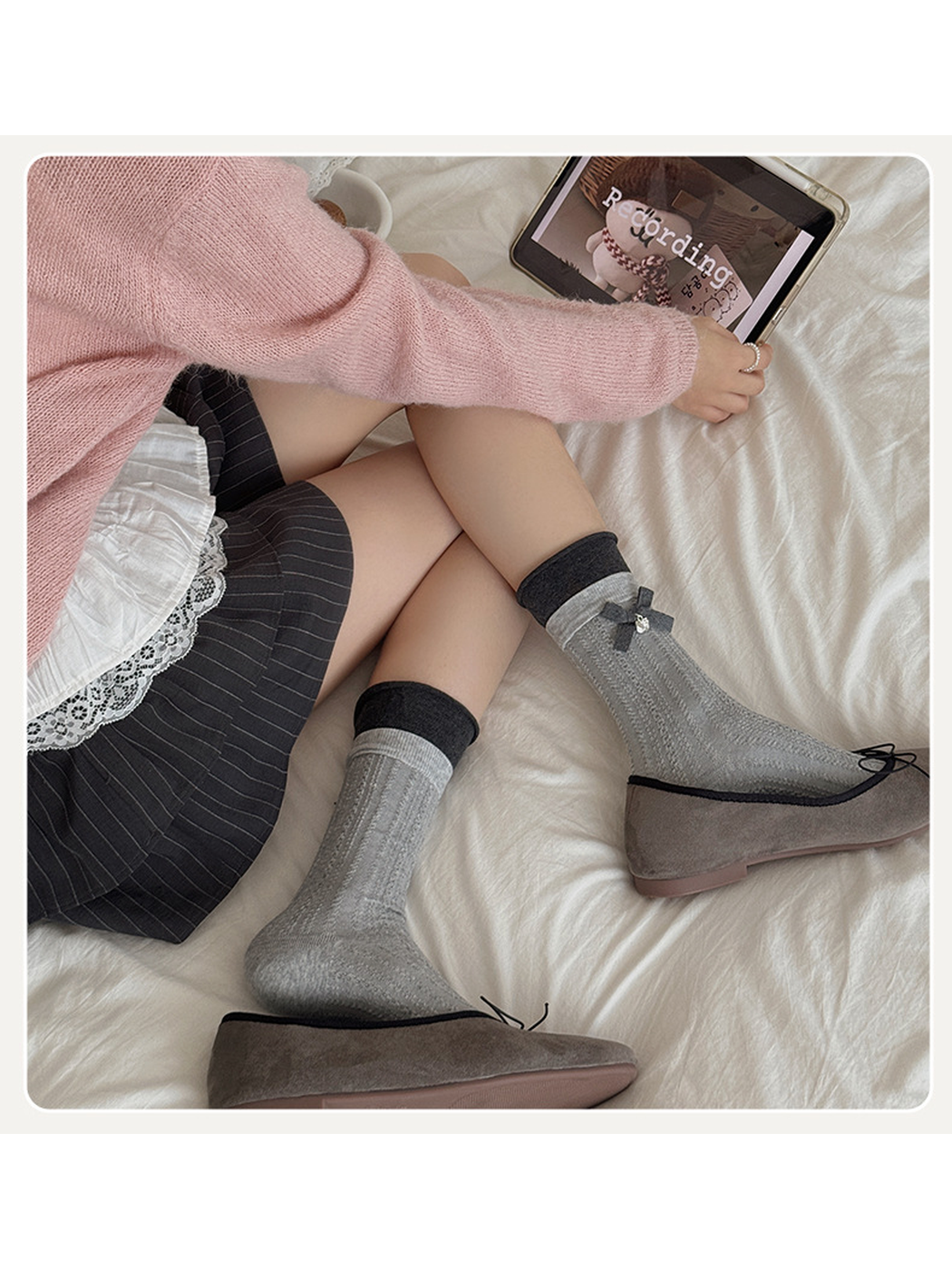 Bow Charm light gray ribbed crew socks styled with gray flats