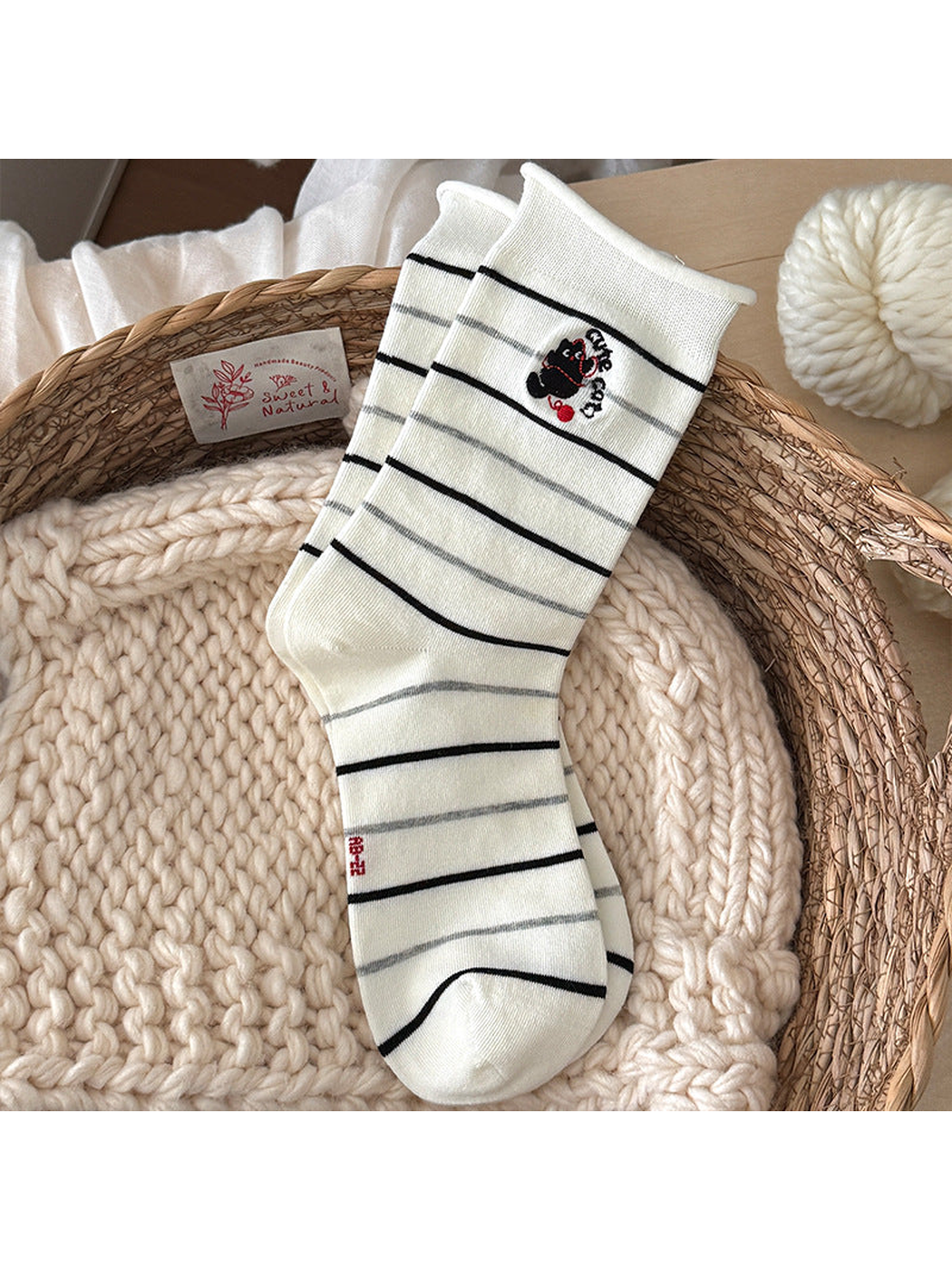 Cherry Stripe ivory crew socks with a rolled cuff