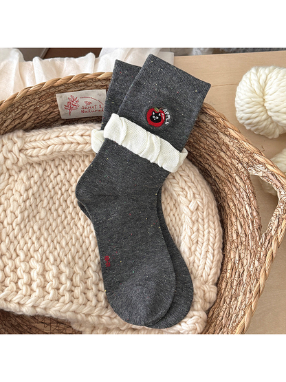 Speckled Apple dark gray crew socks with a contrasting ruffle cuff