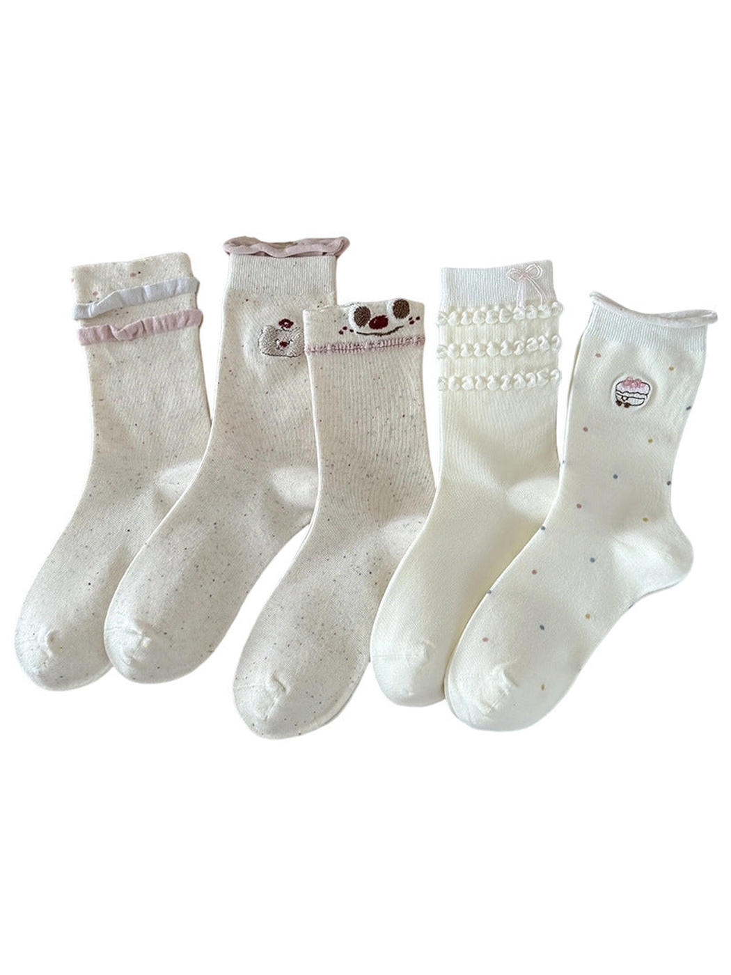 Bow, Cupcake, Bear, Smiley and Ruffle crew sock styles on a white background
