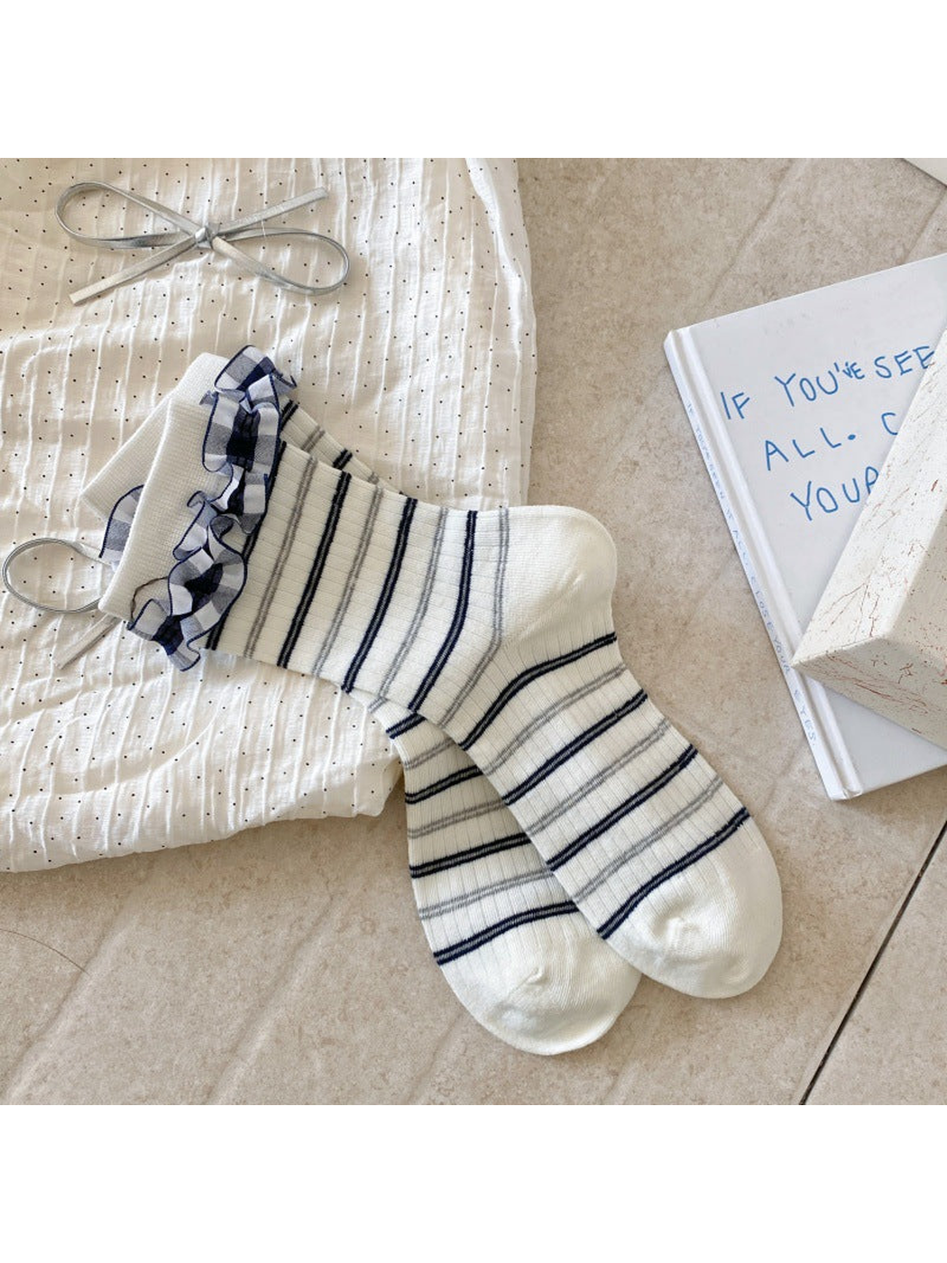 Striped Ruffle ivory crew socks with navy and gray stripes