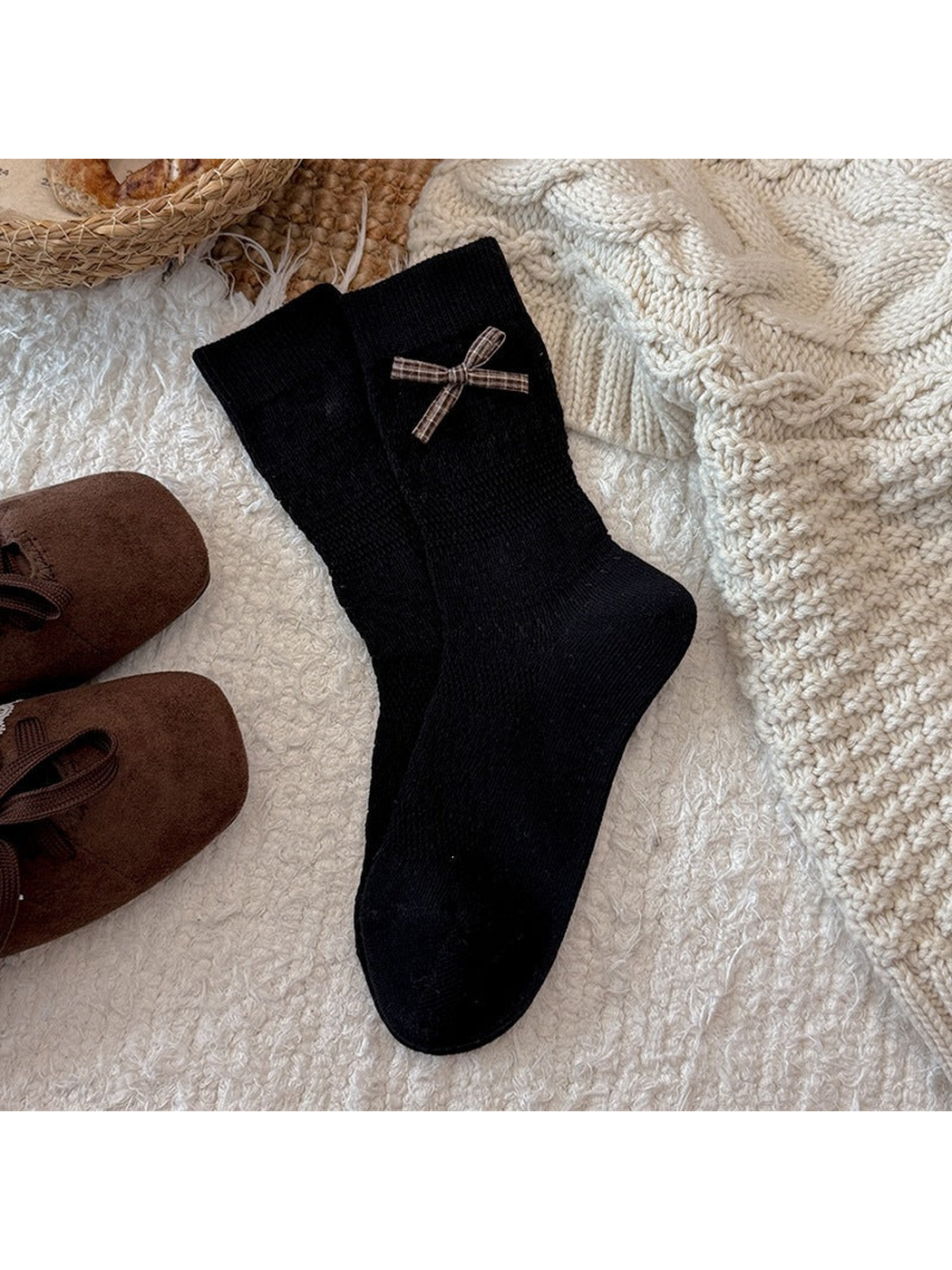 Black crew socks with a plaid bow