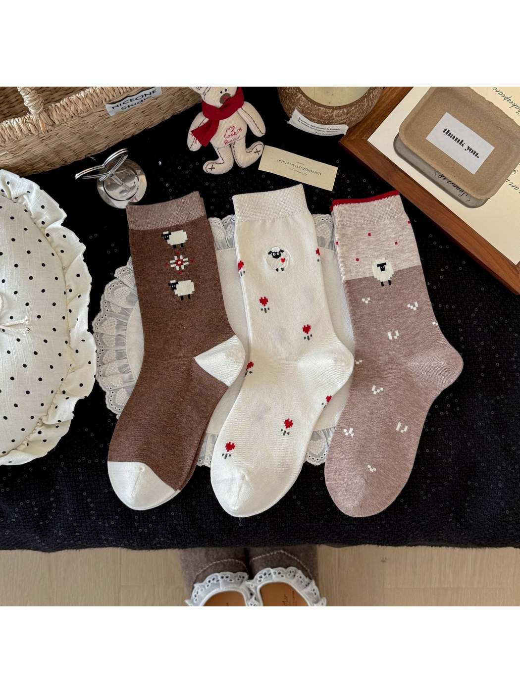 Geometric, Floral, and Abstract sheep-motif crew socks displayed together